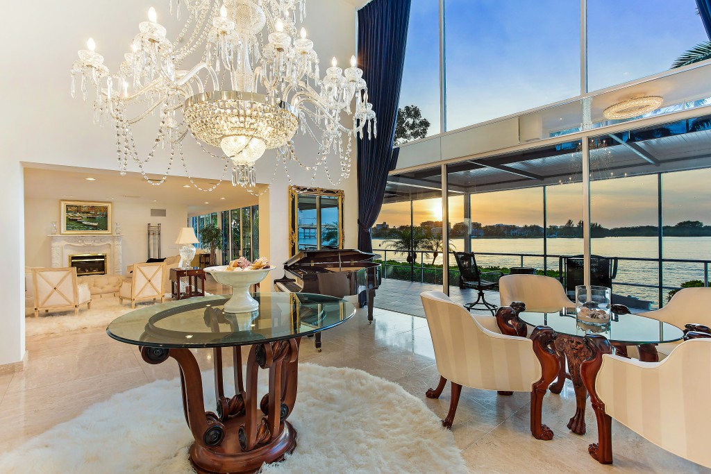 A captivating sunset enhances the opulence of the grand foyer at 1415 Westway. 