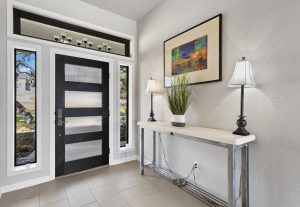 foyer with table and 2 lamps