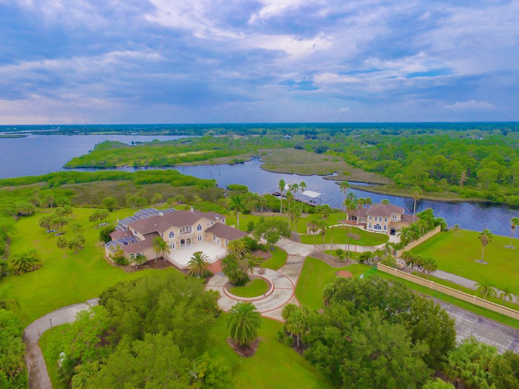 Nearly 20 acres sets the scene for peace and tranquility from this nine-bedroom Port Charlotte home.