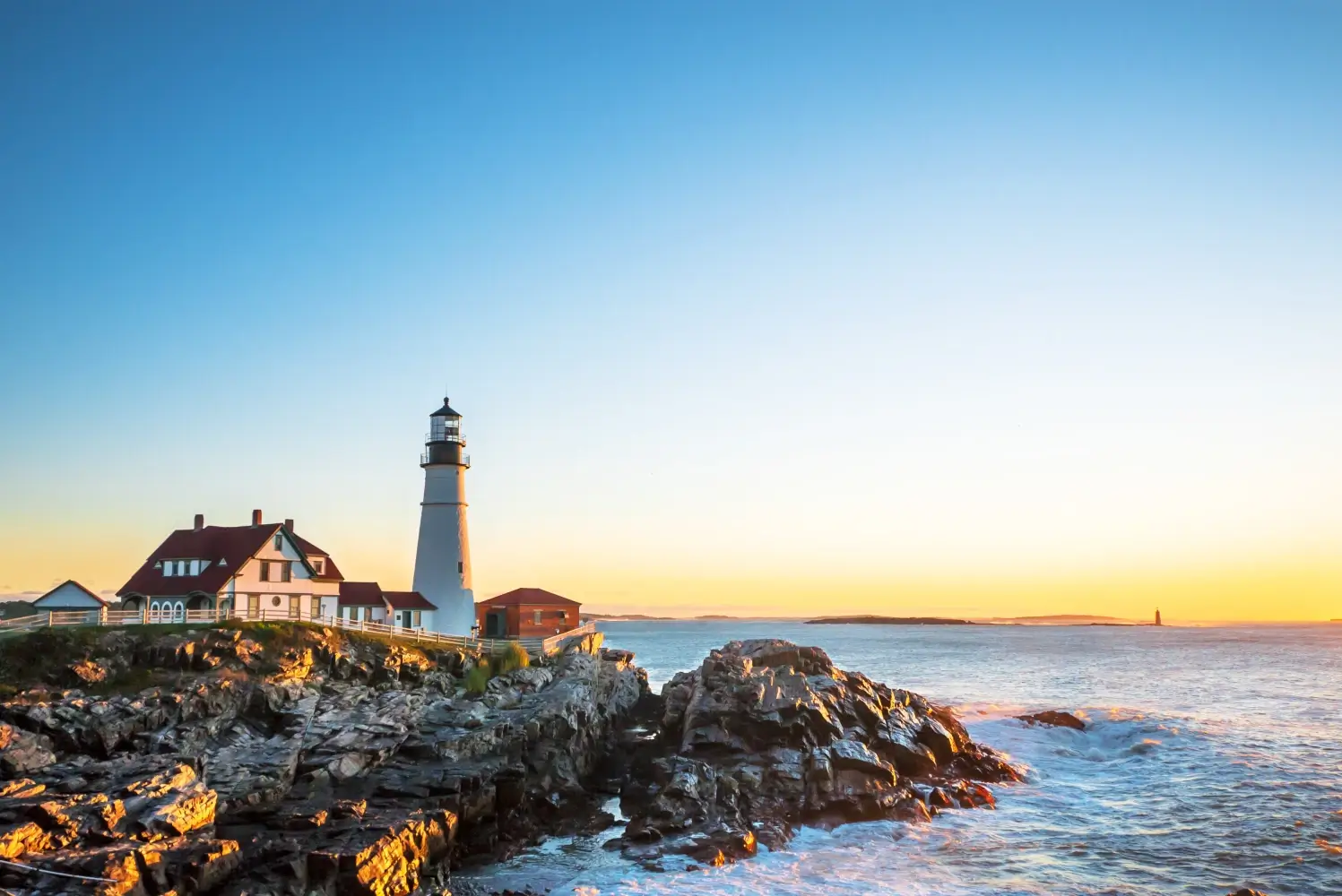 Portland Head Lighthouse at Fort Williams, Maine at sunrise over