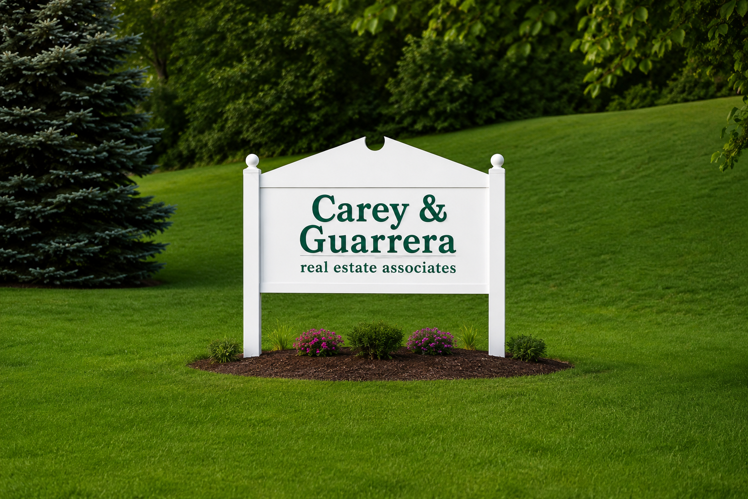 Carey & Guarrera Real Estate sign outside the Shelton office