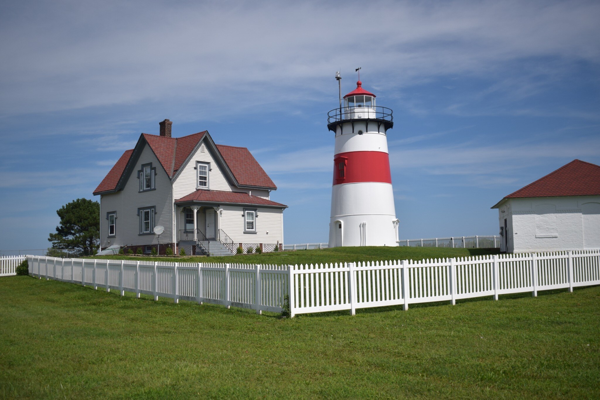 Stratford Point Lighthouse and the old keeper house on the Stratford, CT shoreline