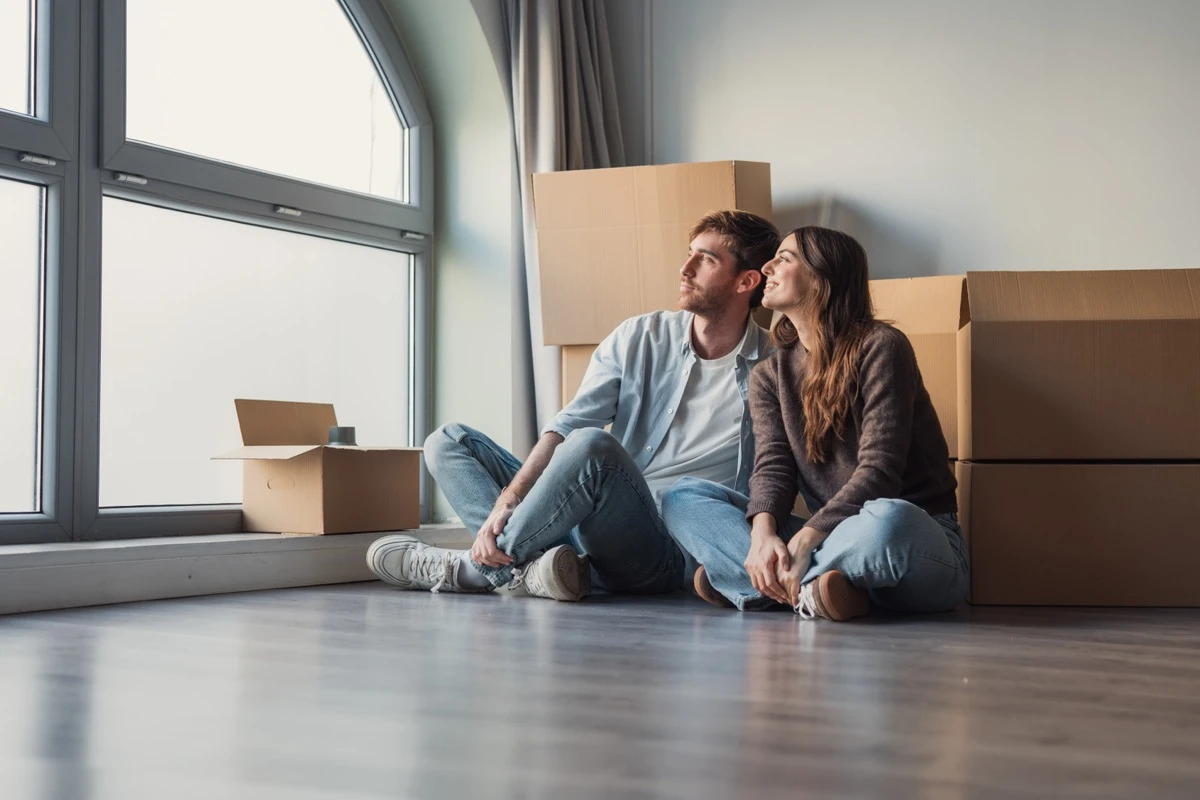 Moving day, boxes in a bright room, new-home feeling