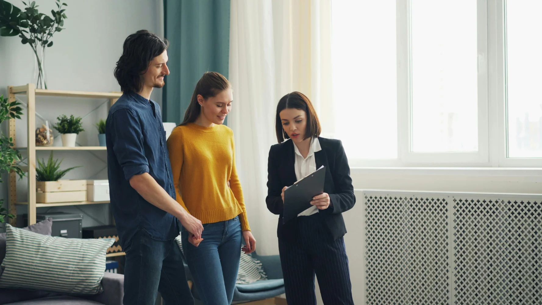 Agent walking a buyer through a home