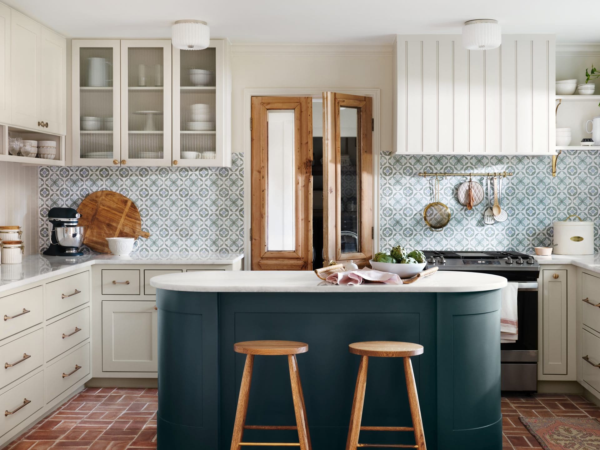 Kitchen island in a bold color with rounded corners