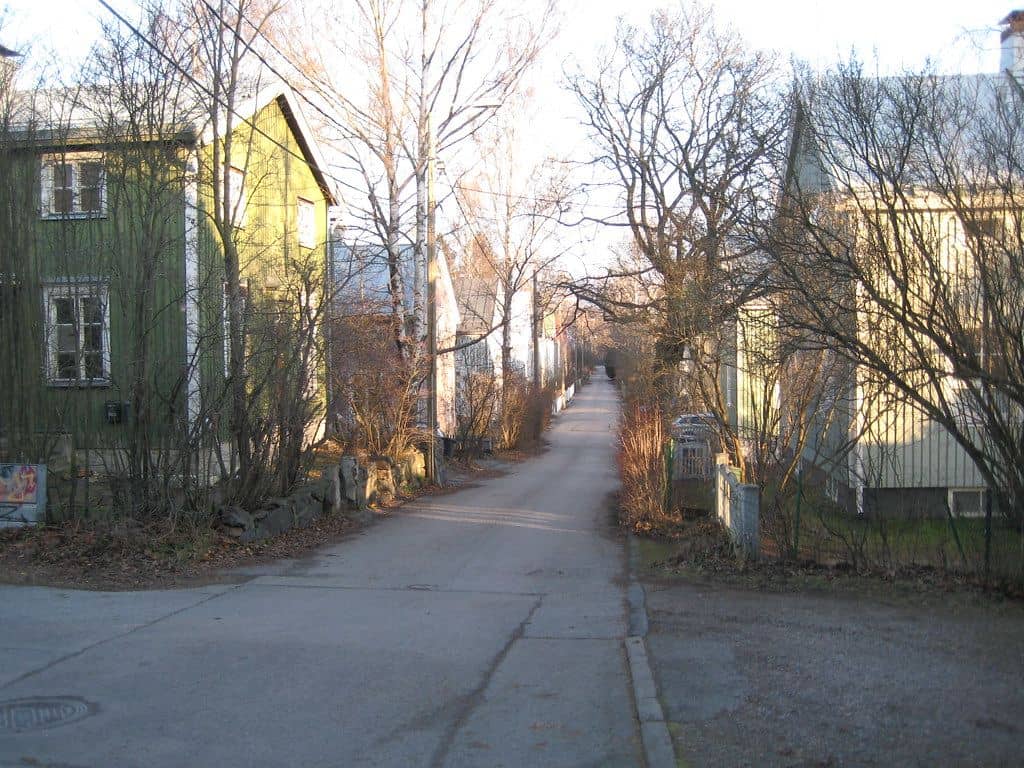Neighborhood scene representing active local housing demand