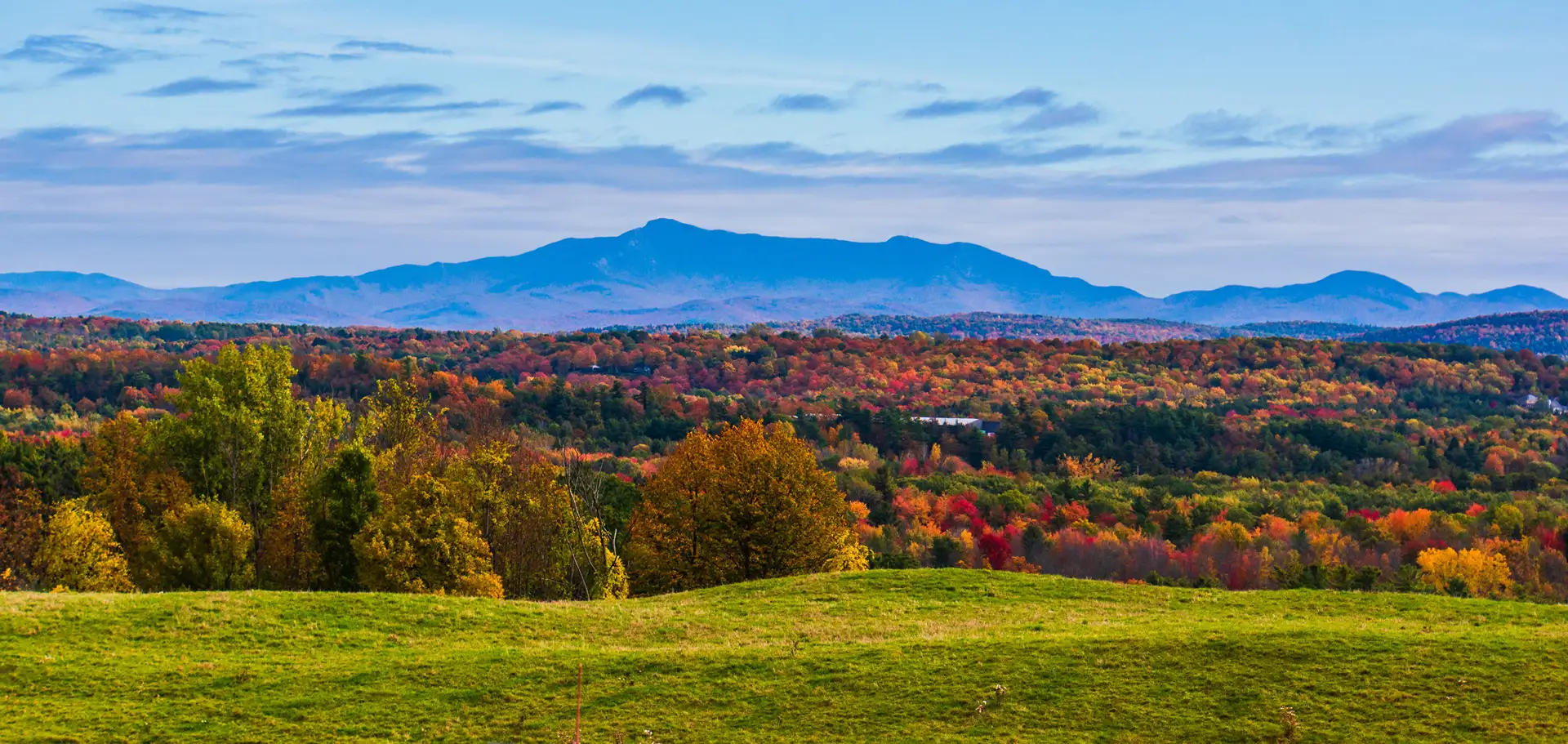 view of Mount Mansfield from Shelburne Farms in autumn