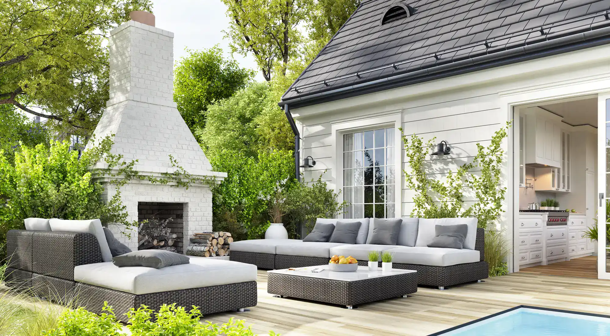 Patio with garden furniture beside a pool