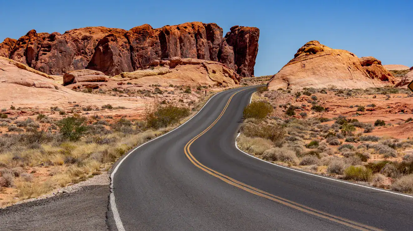 Road through red rock desert