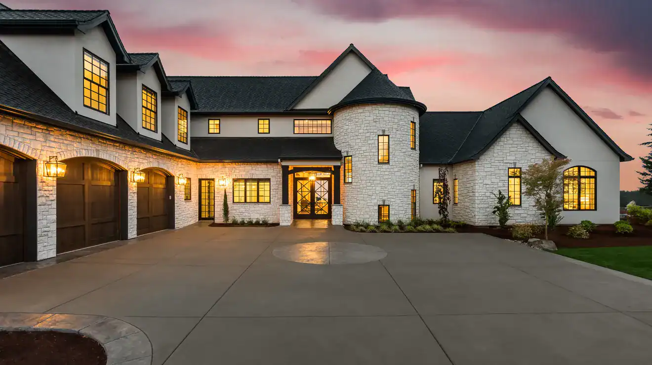Home exterior and driveway at sunset
