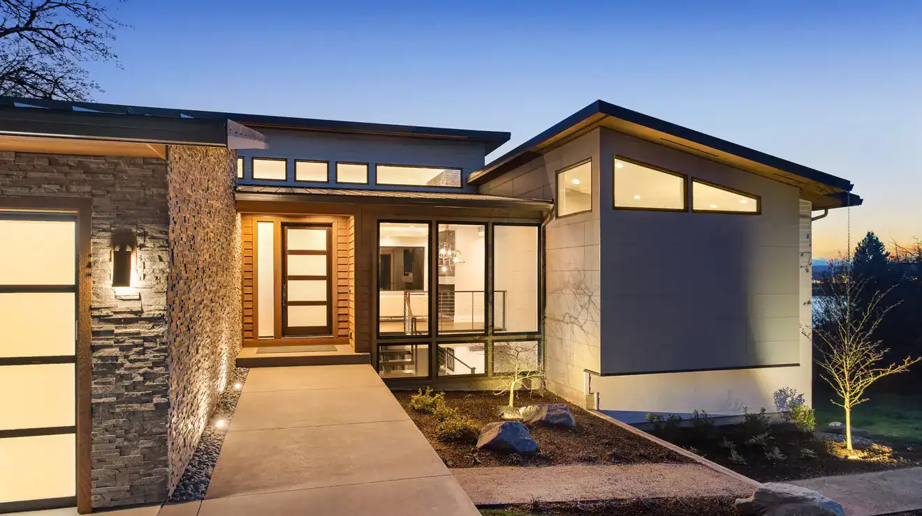 Modern home exterior at dusk