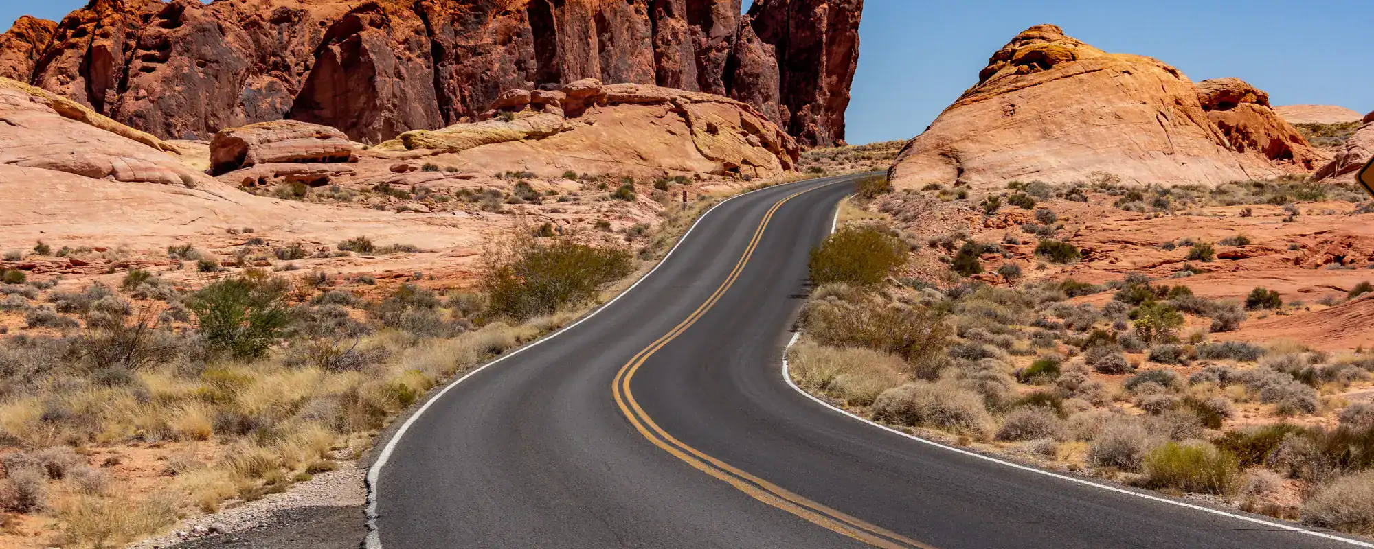 Road through red rock desert