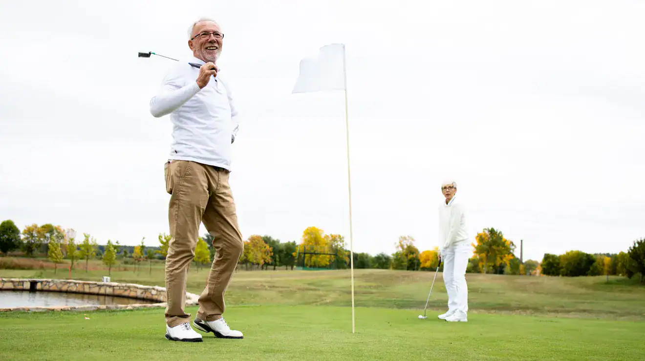 Senior man playing golf