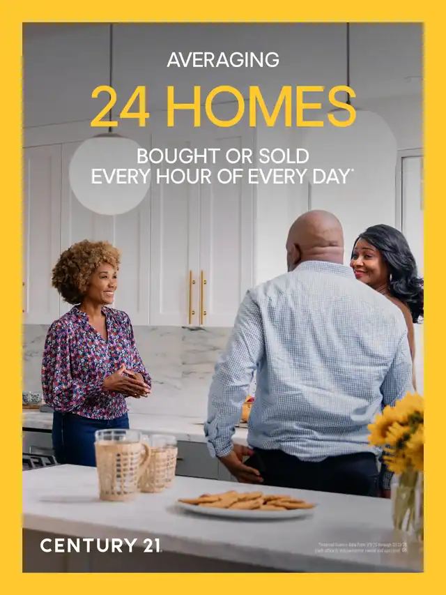 Century 21 poster reading Averaging 24 homes bought or sold every hour of every day, showing an agent greeting a couple in their kitchen
