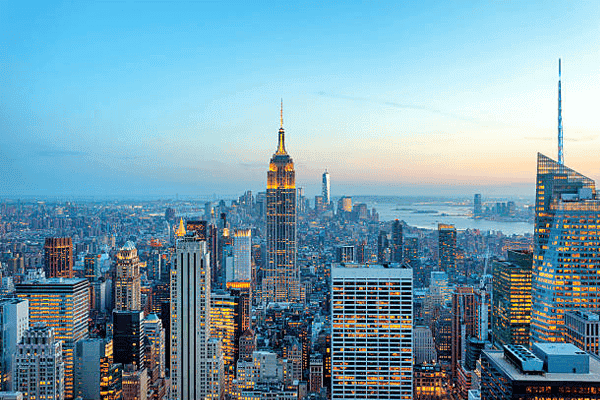 The Empire State Building and midtown Manhattan skyline at dusk
