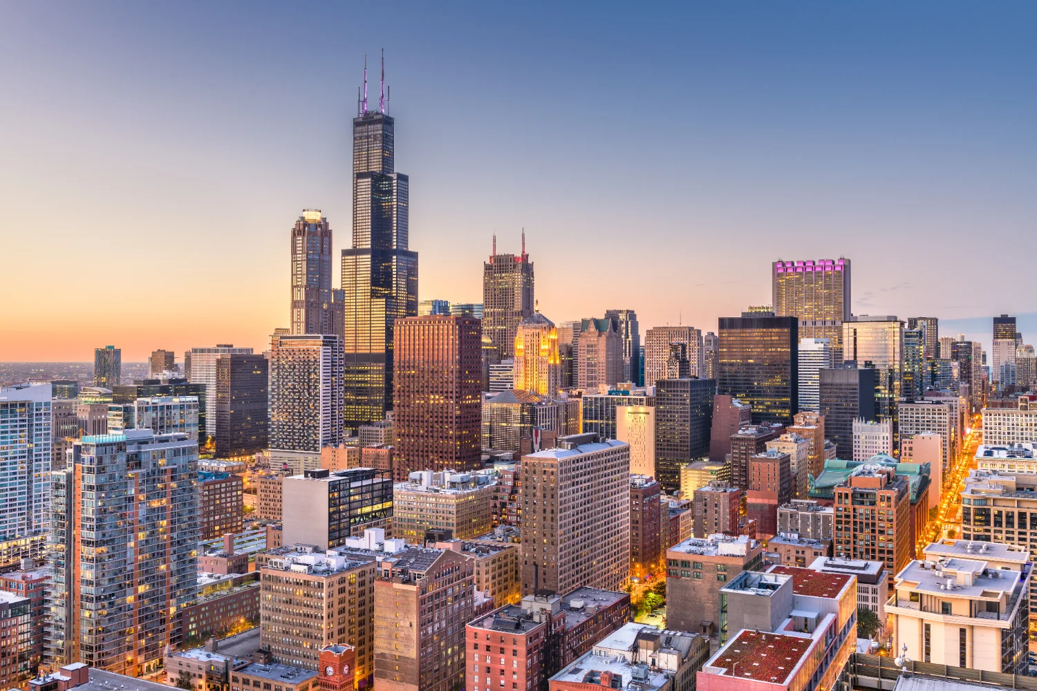 Downtown Chicago skyline at dusk with the Willis Tower
