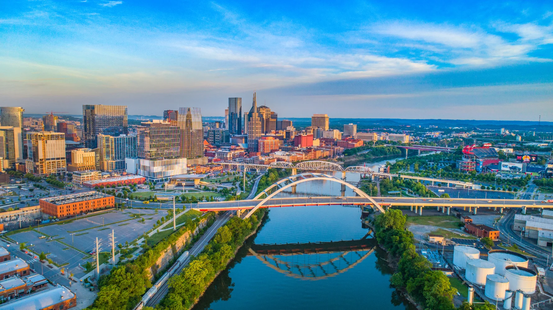 Nashville Tennessee skyline at dusk with the Cumberland River