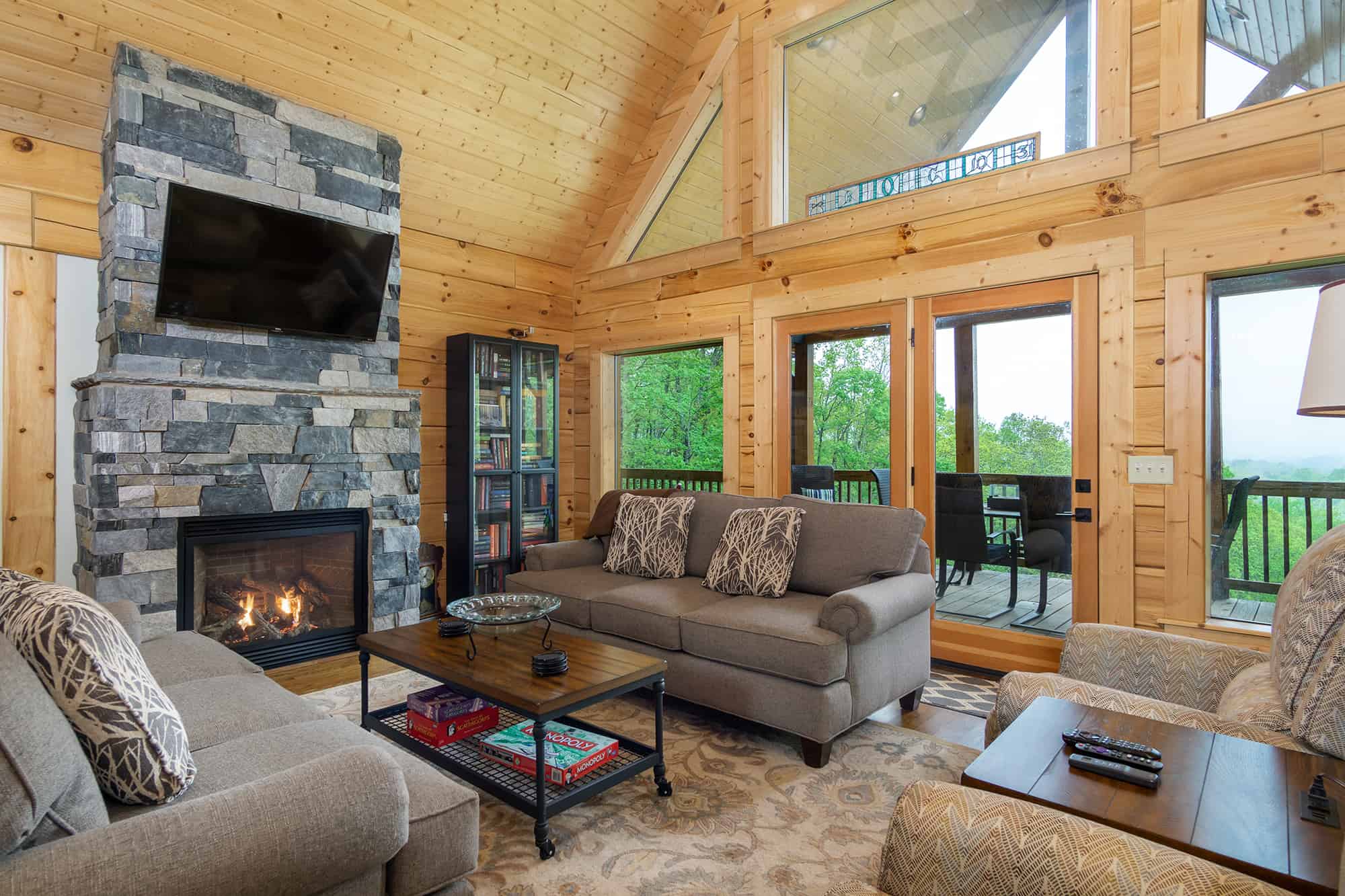 Living Room in Cabin with Stone Fireplace