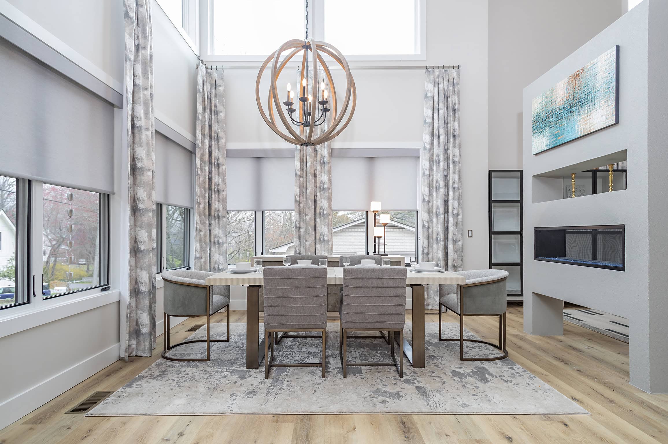 Dining Room with Circular Chandelier in North Carolina Home