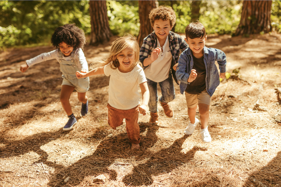 kids running in forest