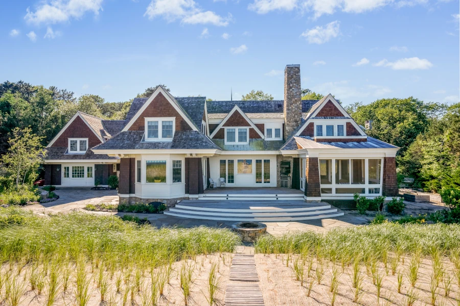 Bench near the beach house on a sunny summer day