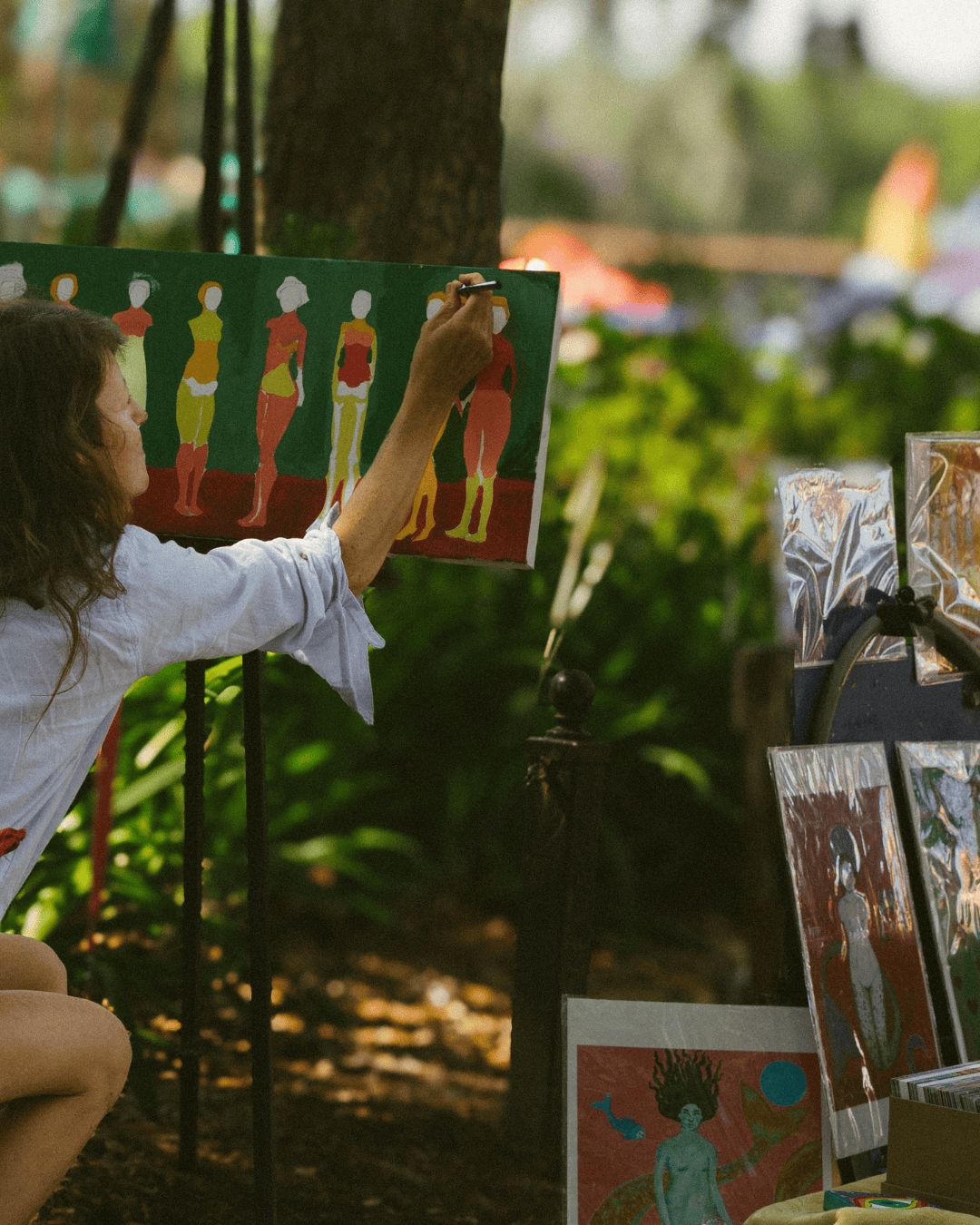 artist painting al fresco in downtown Greenville, SC