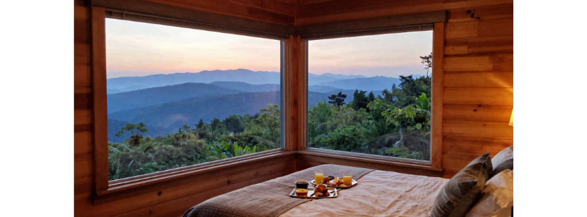 view of blue ridge mountains from window of bedroom
