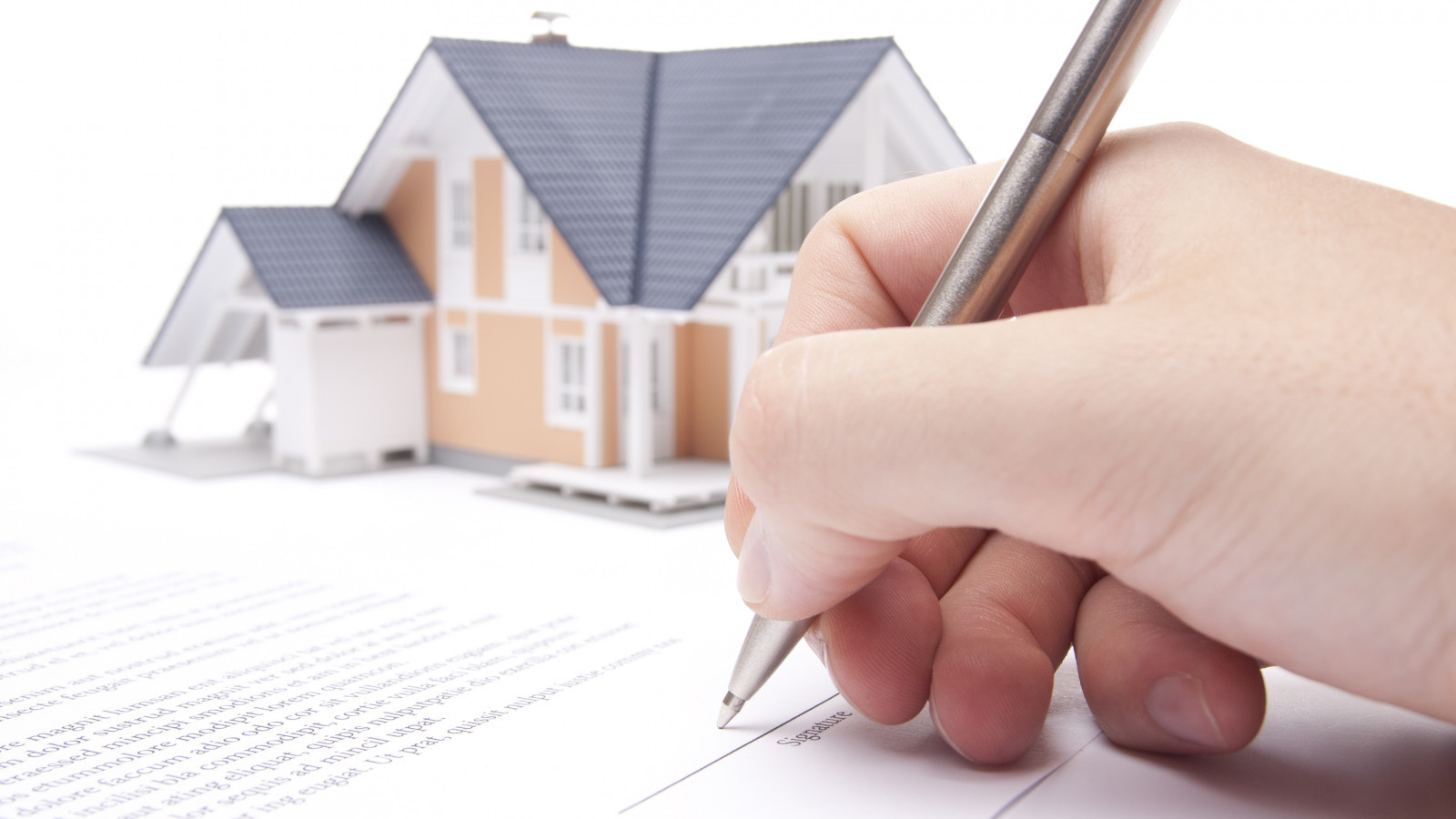 background photo, hand with a pen