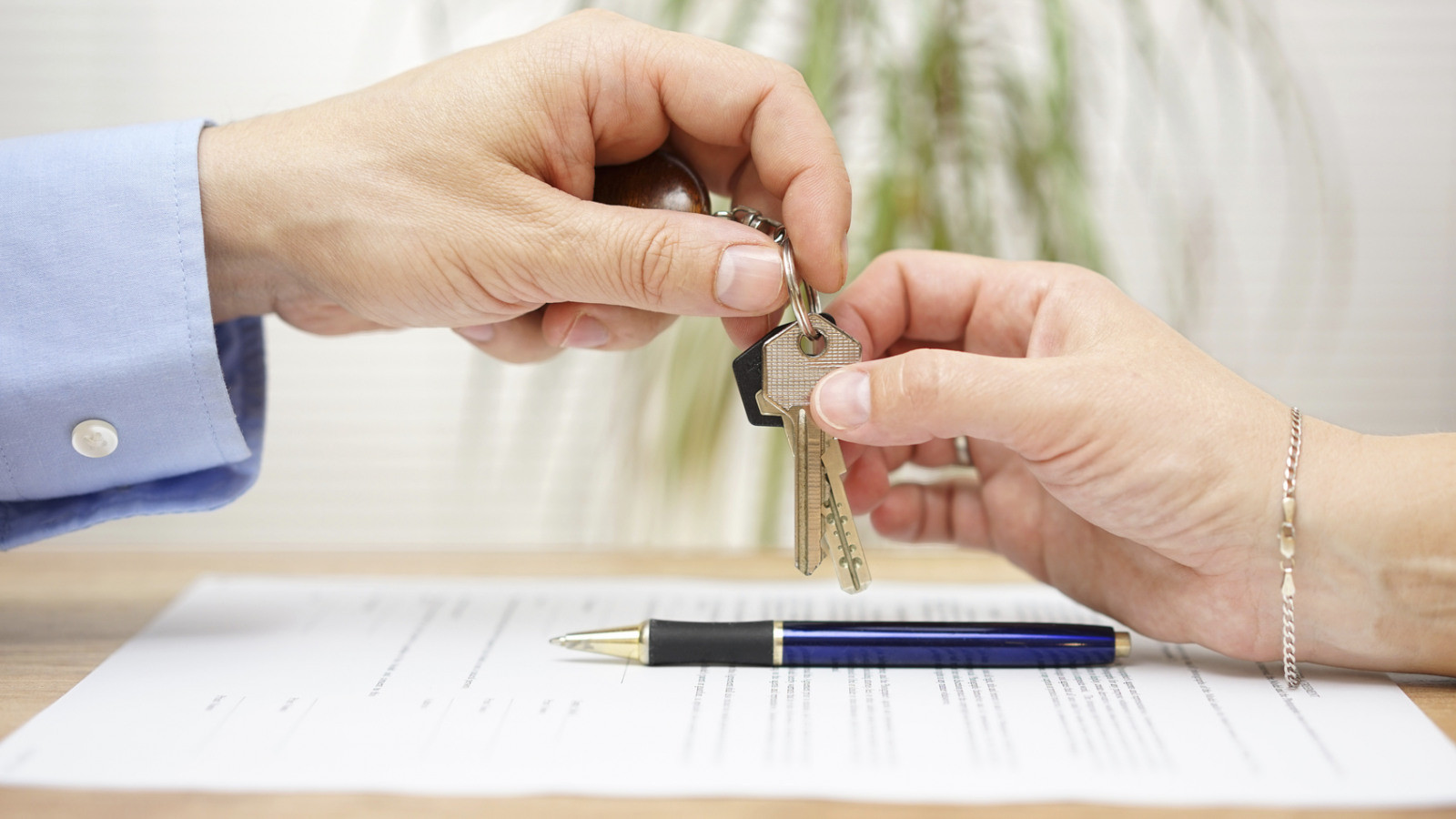 background photo, hands with keys