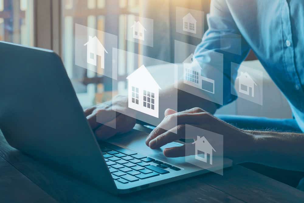 Laptop with Graphics of Homes