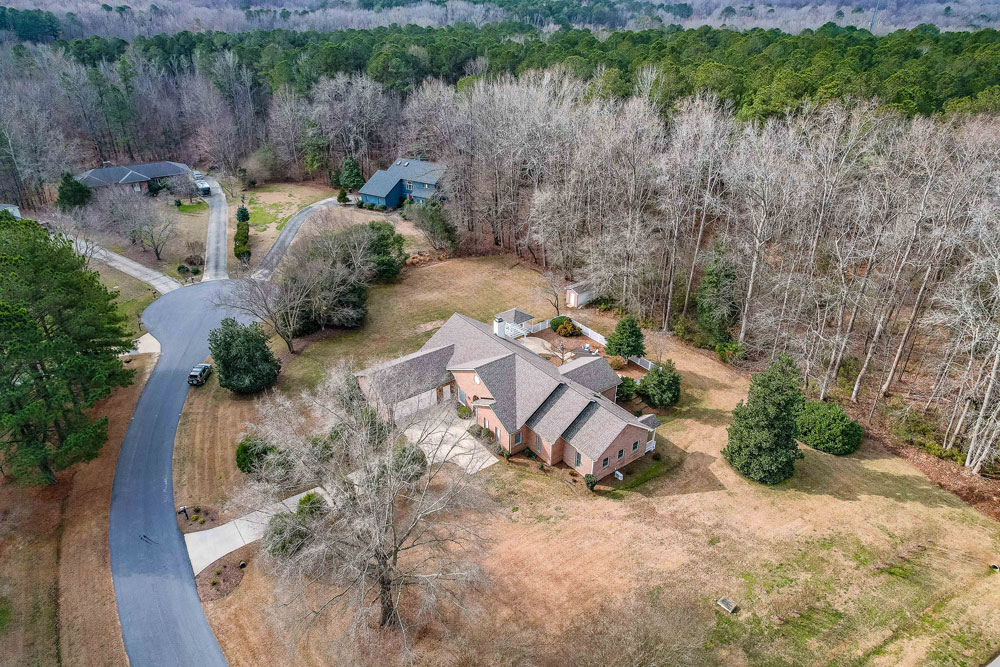 aerial view of brick house from side