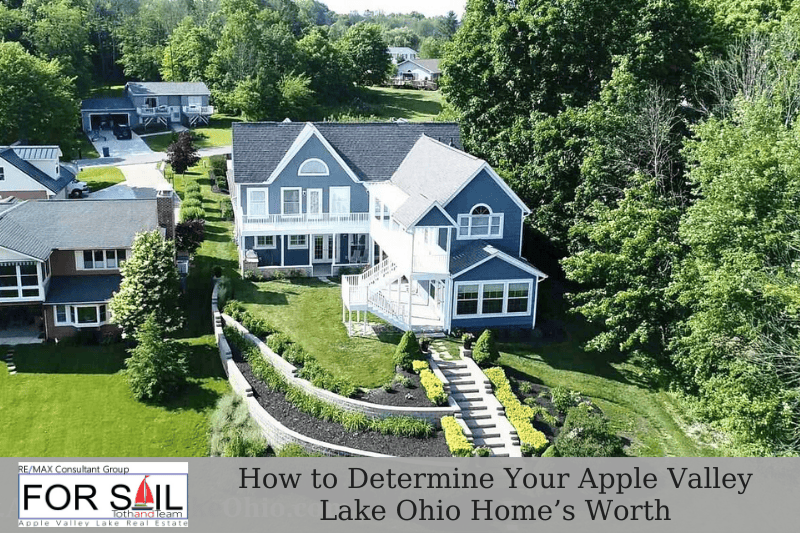 Lakefront home at Apple Valley Lake Ohio with landscaped yard and water access, representing factors that influence Apple Valley Lake Ohio home value and real estate pricing.