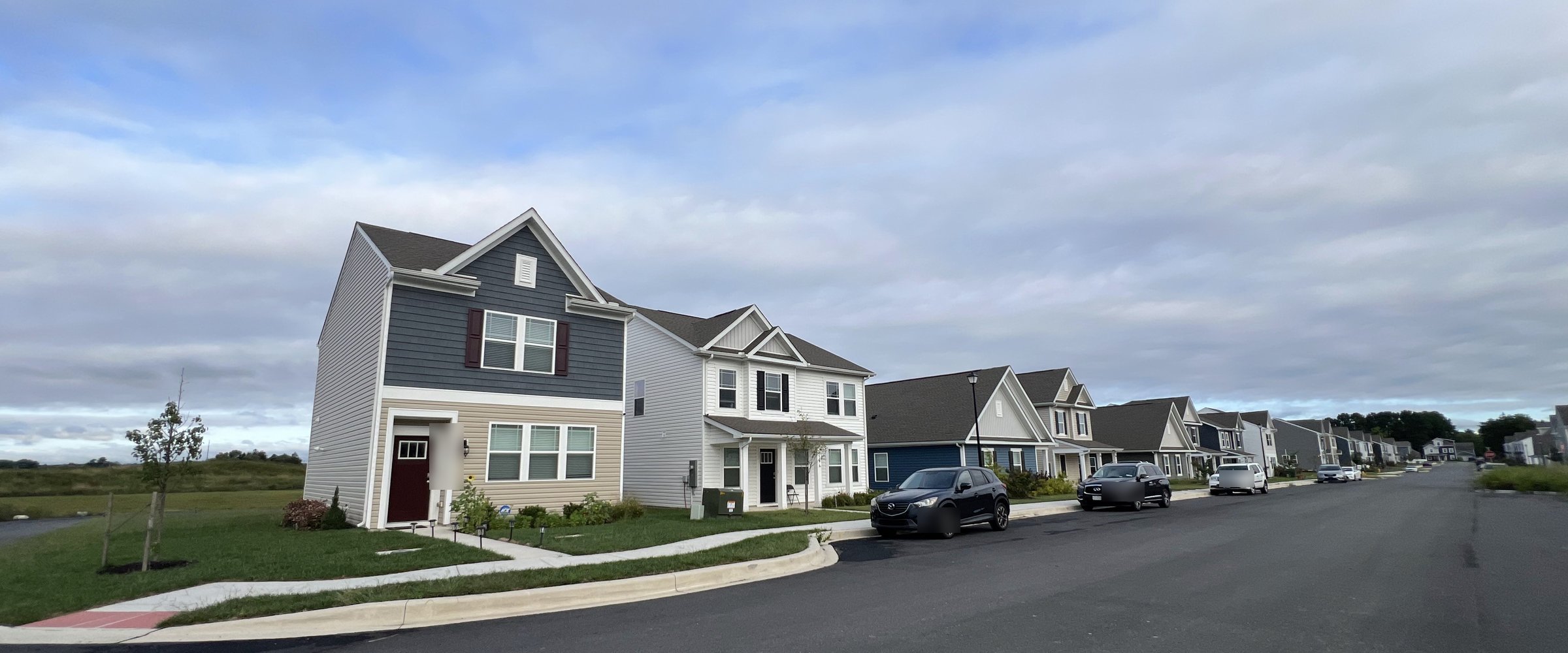 Simpsons Crossing street in Milford, Delaware, with front porches, sidewalks and streetlights