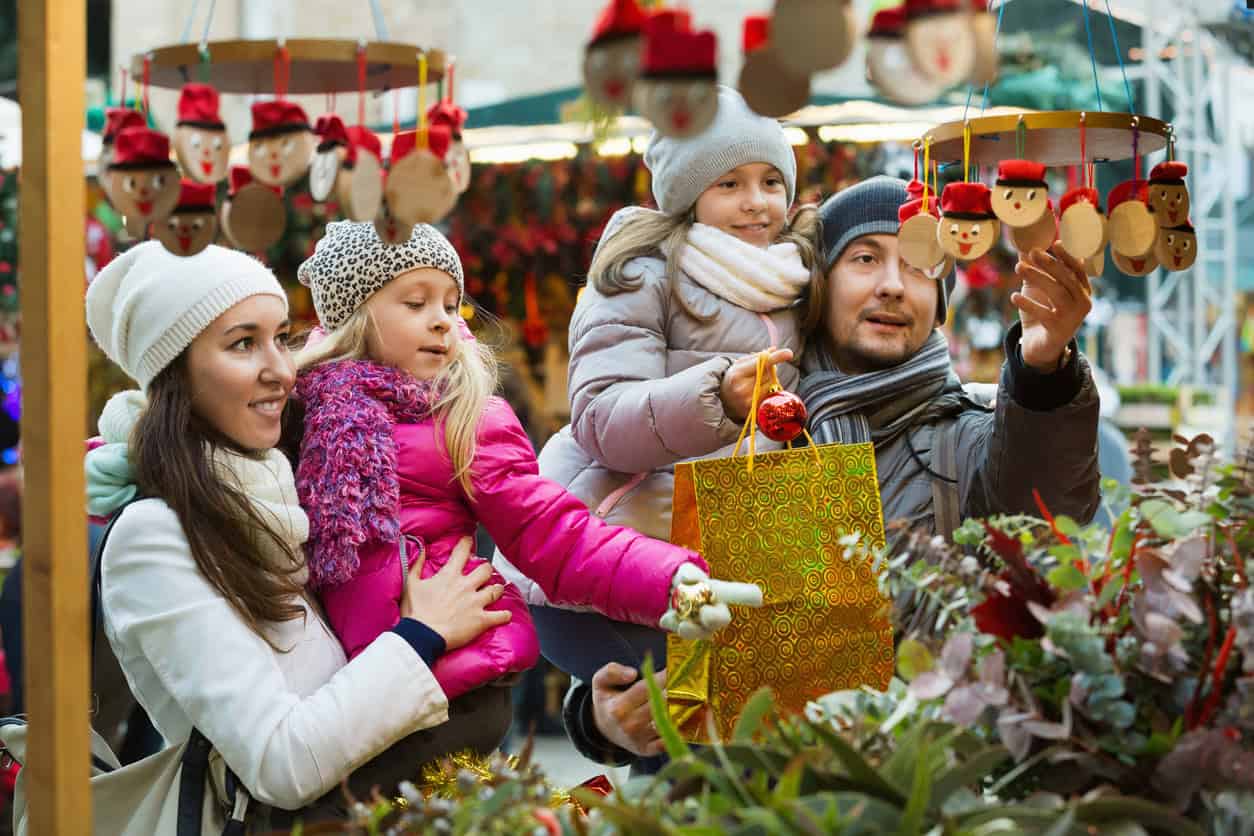 family at holiday market