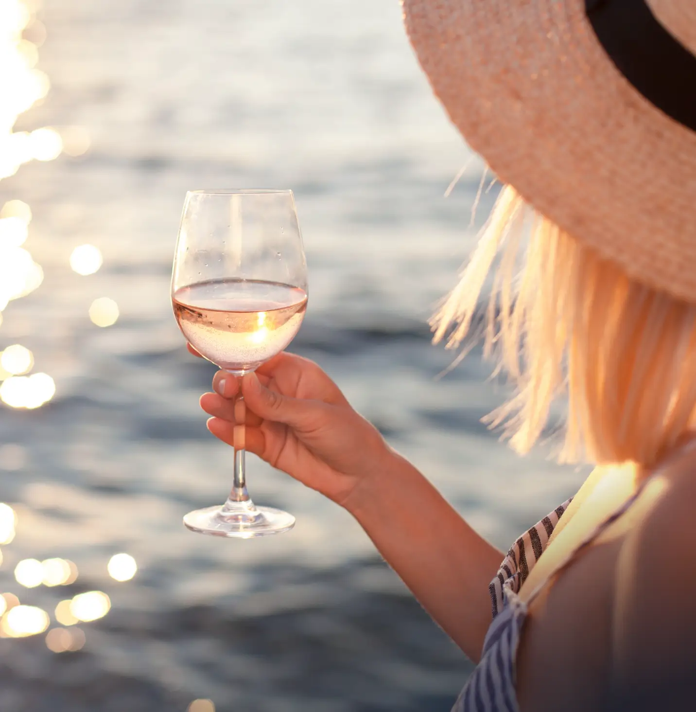Woman with a vine on the beach