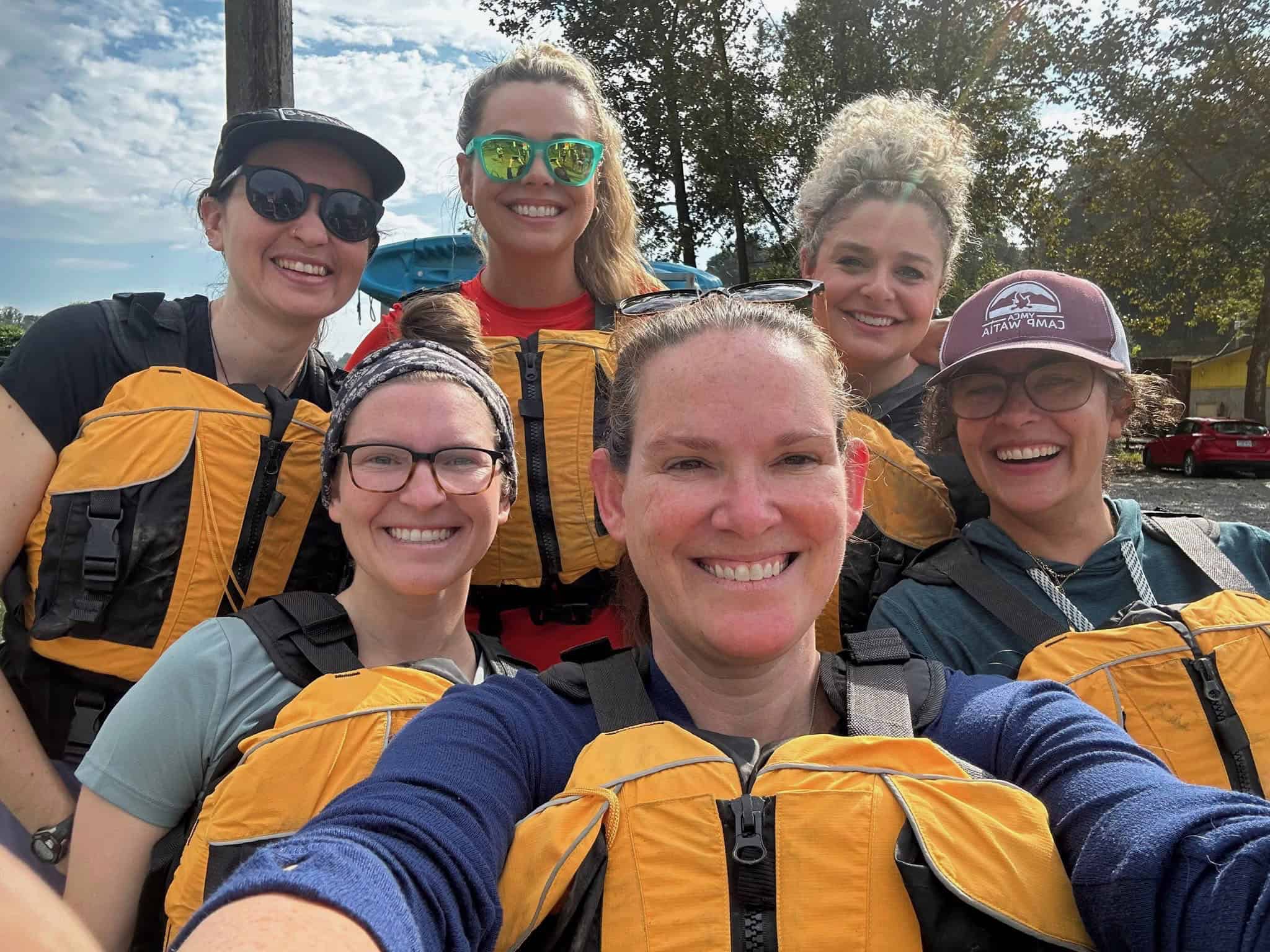 GreyBeard Realty staff smiling together after volunteering in Asheville NC