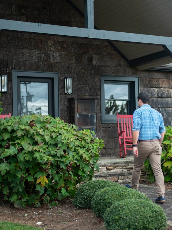 Client walking into Lake James office