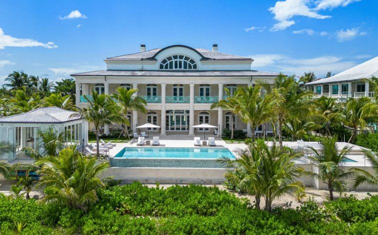 Luxury Bahamas estate with pool and palm trees — bahamas permanent residency real estate
