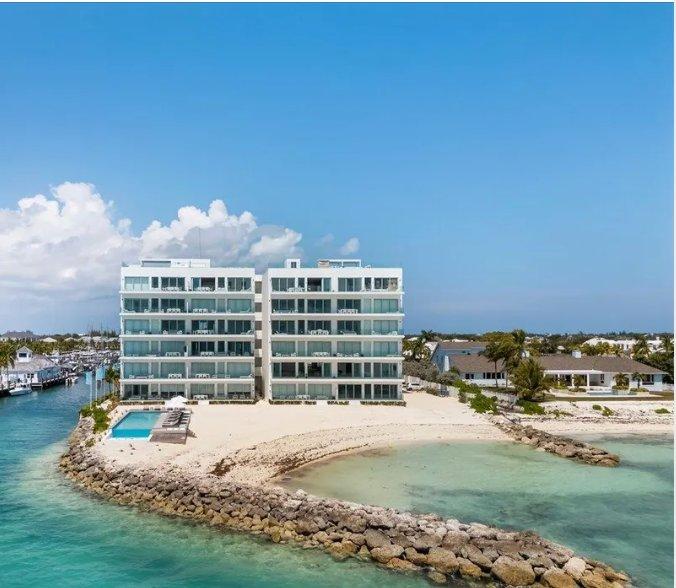Beachfront condos Bahamas for sale — waterfront property qualifying for permanent residency