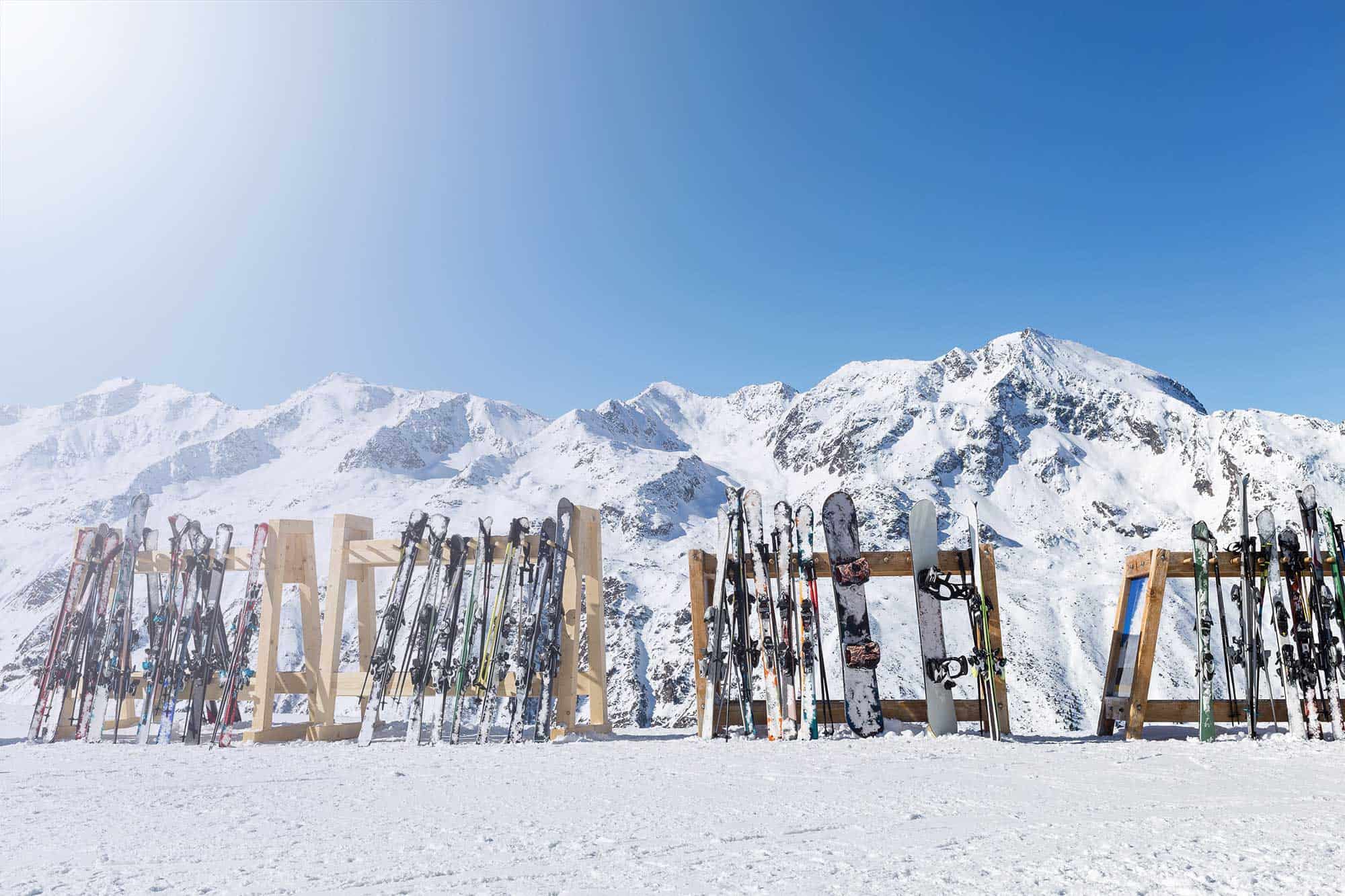 Skis resting against a mountain backdrop