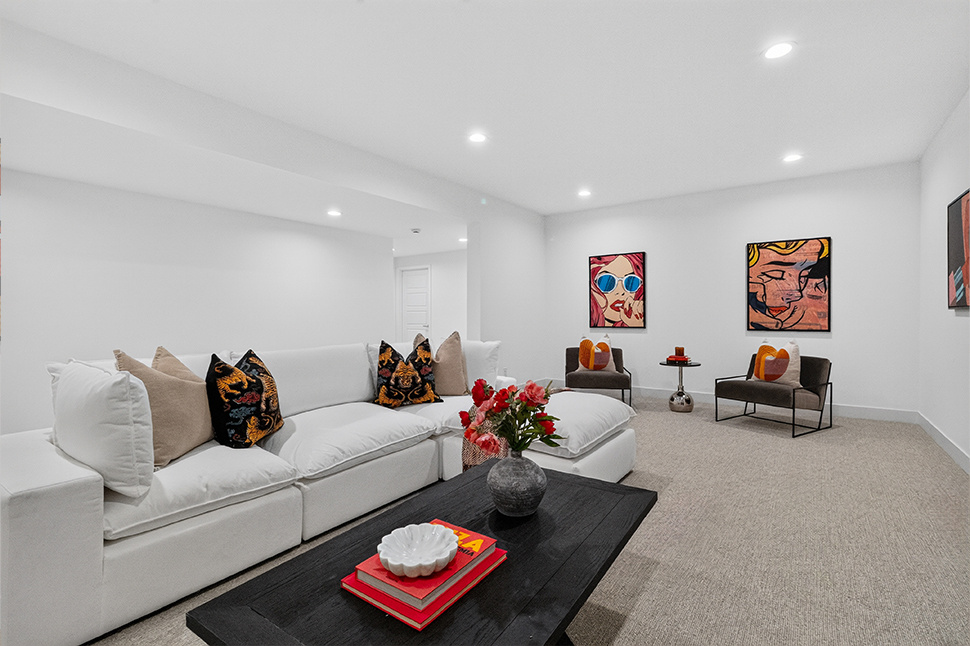 Finished basement living space after renovation and staging, Denver listing