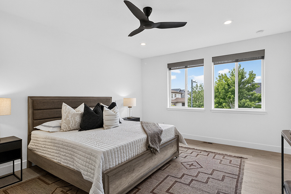 Bedroom after neutral paint and professional staging, Denver listing