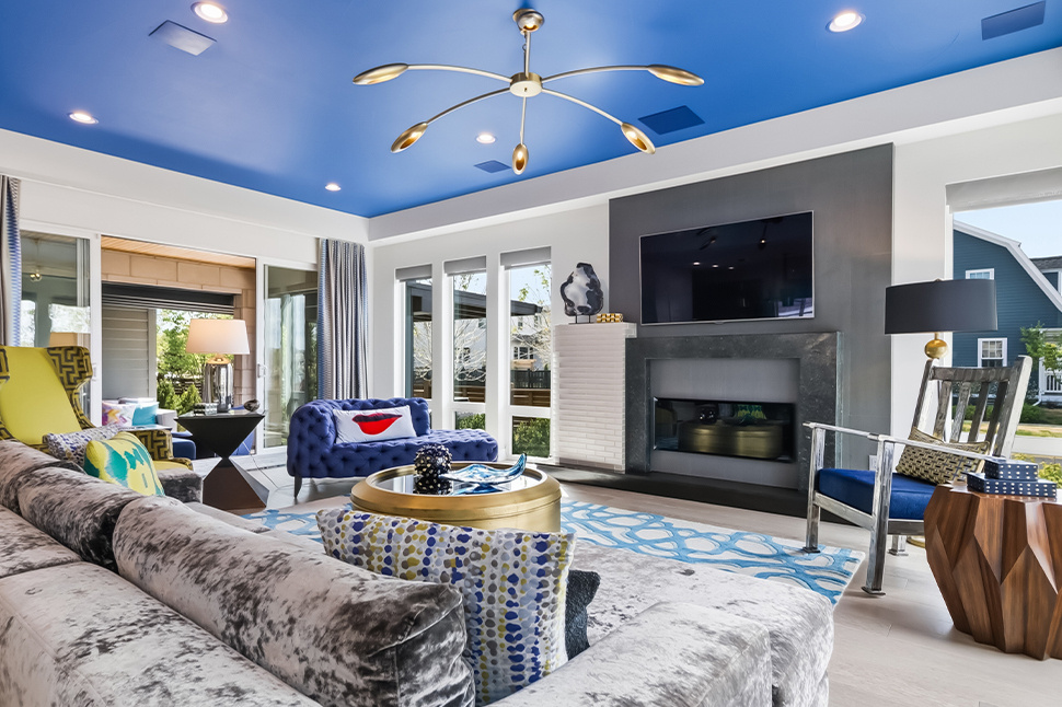 Living room with custom paint and personal furnishings before staging, Denver listing
