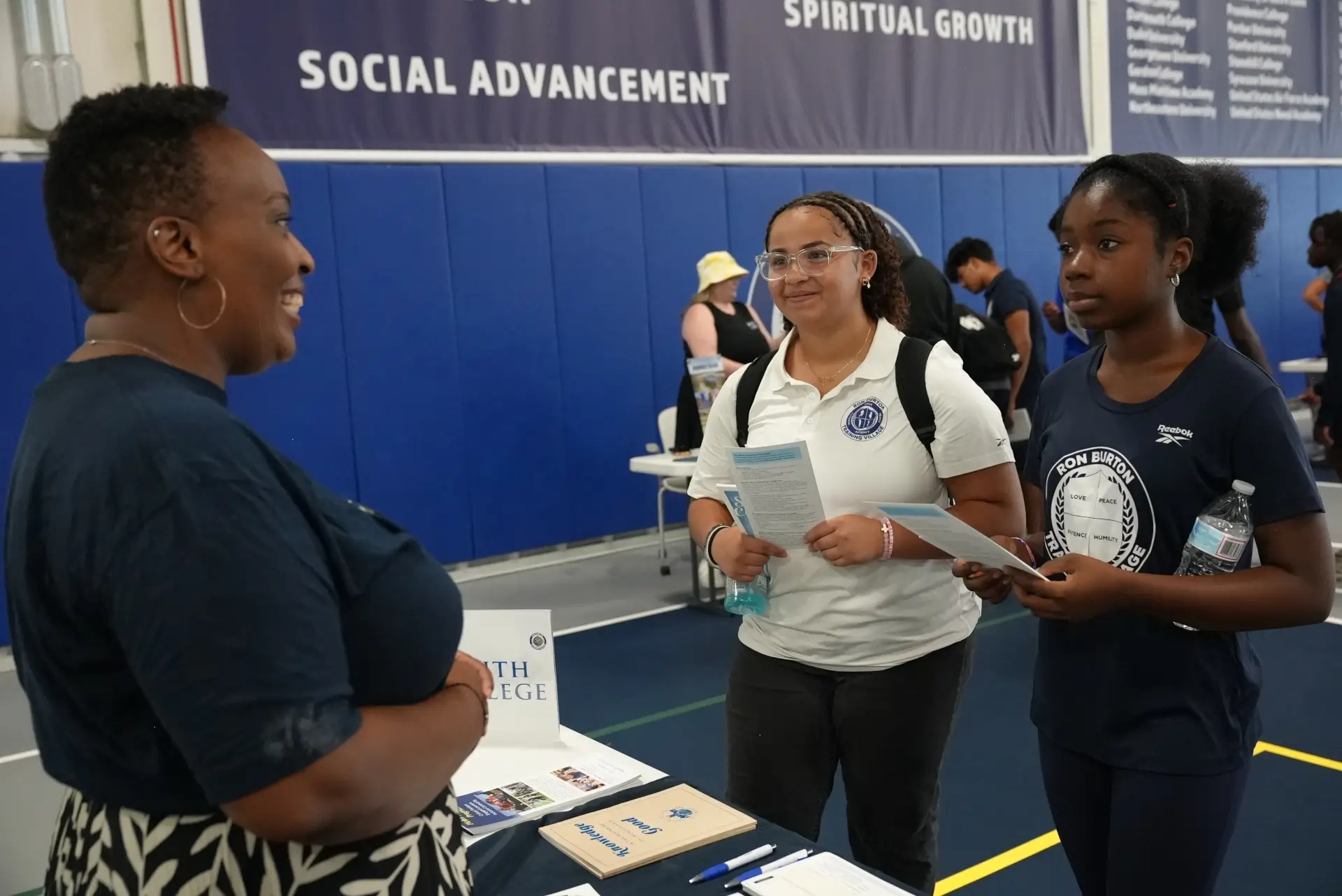 Girls getting advice from Admissions Counselor